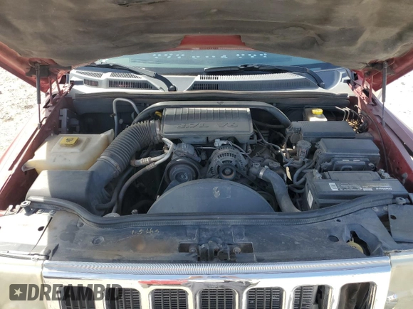 2010 Jeep Commander Sport z VIN 1J4RG4GK0AC156826, wystawiony jako Copart lot #50707345 z przebiegiem 213 694 mil mil oraz Szkoda całkowita • Salvage title. Historia ofert i sprzedaży dostępna na DreamBid. Obrazek 13.