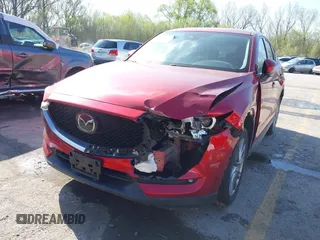 2021 Mazda CX-5 Grand Touring with VIN JM3KFBDM8M1390188, listed as a IAAI auction lot 42000444 with 84,908 mi miles. Bid and sale history available at carsss.com. Image 6.