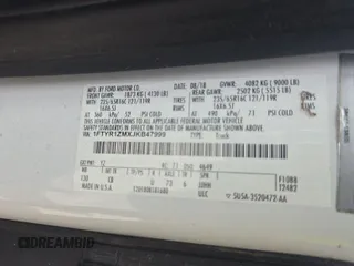 2018 Ford Transit with VIN 1FTYR1ZMXJKB47999, listed as a IAAI auction lot 42787302 with 140,957 mi miles and . Bid and sale history available at DreamBid. Image 6.