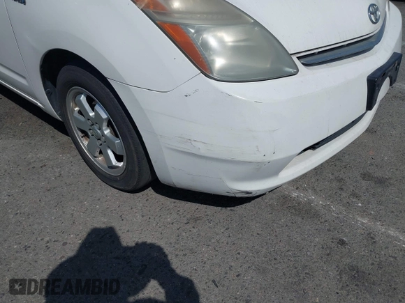 2006 Toyota Prius with VIN JTDKB20UX67527206, listed as a IAAI auction lot 42093925 with 124,256 mi miles. Bid and sale history available at carsss.com. Image 6.
