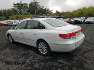 2010 Hyundai Azera GLS z VIN KMHFC4DD4AA513796, wystawiony jako Copart lot #59782965 z przebiegiem 56 958 mil mil oraz Szkoda całkowita • Salvage title. Historia ofert i sprzedaży dostępna na DreamBid. Obrazek 2.