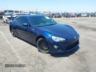2013 Scion FR-S z VIN JF1ZNAA11D2717111, wystawiony jako IAAI lot #42463542 z przebiegiem 160 517 mil mil oraz . Historia ofert i sprzedaży dostępna na DreamBid. Obrazek 1.