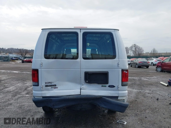 2013 Ford Econoline Cargo Commercial with VIN 1FTNE1EW2DDB11061, listed as a IAAI auction lot 41808318 with 230,677 mi miles. Bid and sale history available at carsss.com. Image 15.