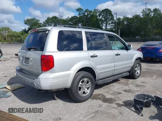 2003 Honda Pilot EX with VIN 2HKYF18603H504829, listed as a IAAI auction lot 42083247 with 247,429 mi miles and . Bid and sale history available at carsss.com. Image 4.