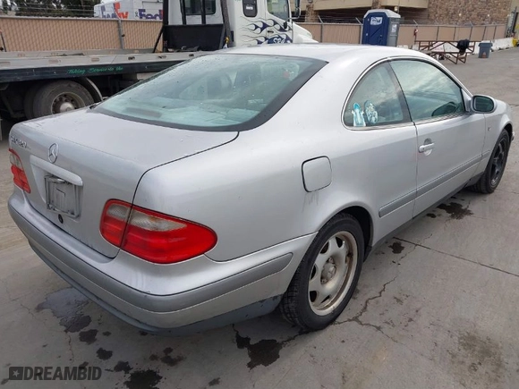 1998 Mercedes-Benz CLK-Class with VIN WDBLJ65G7WF030460, listed as a IAAI auction lot 41633288 with 327,848 mi miles. Bid and sale history available at carsss.com. Image 4.
