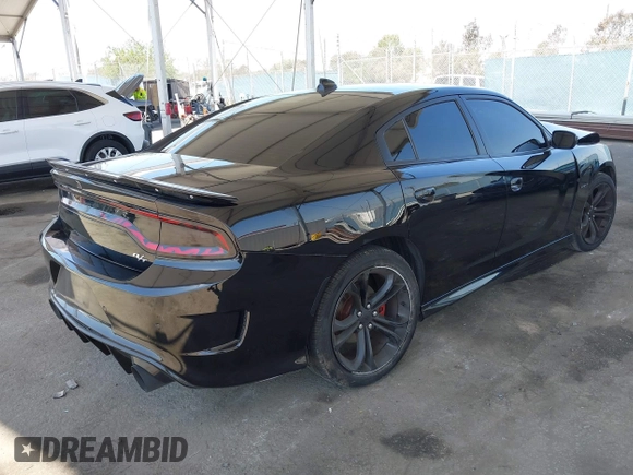 2021 Dodge Charger R/T with VIN 2C3CDXCT7MH547854, listed as a IAAI auction lot 41986397 with 73,918 mi miles and . Bid and sale history available at carsss.com. Image 4.