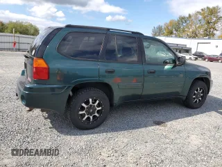 2005 GMC Envoy SLT with VIN 1GKDT13S952144349, listed as a Copart auction lot 71800694 with 137,614 mi miles and Salvage Title. Bid and sale history available at DreamBid. Image 3.