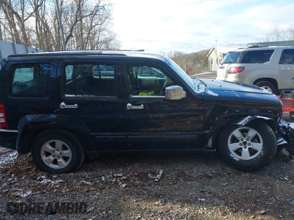 2012 Jeep Liberty Sport with VIN 1C4PJMAK0CW209498, listed as a IAAI auction lot 41881406 with 127,855 mi miles. Bid and sale history available at carsss.com. Image 12.