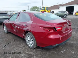 2019 Toyota Camry LE with VIN 4T1B11HK8KU823736, listed as a IAAI auction lot 42166696 with 21,732 mi miles and . Bid and sale history available at DreamBid. Image 3.