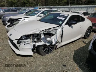 2023 Toyota GR86 with VIN JF1ZNBC1XP8761886, listed as a Copart auction lot 43408215 with 36,410 mi miles and Salvage Title. Bid and sale history available at carsss.com. Image 1.