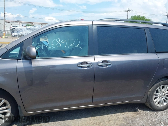 2014 Toyota Sienna XLE с VIN 5TDYK3DC8ES451829, выставлен на аукционе IAAI как лот 42689122 с пробегом 104 729 миль миль и . История ставок и продаж доступна на DreamBid. Изображение 14.