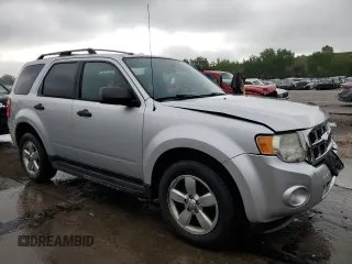 2011 Ford Escape XLT с VIN 1FMCU9DG8BKC62302, выставлен на аукционе Copart как лот 58240715 с пробегом 159 739 миль миль и Списание • Salvage title. История ставок и продаж доступна на DreamBid. Изображение 4.