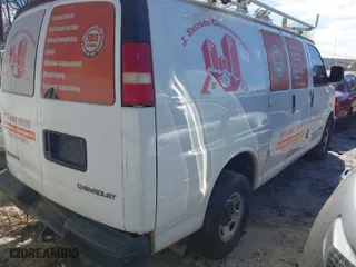 2005 Chevrolet Express Cargo Van with VIN 1GCGG25V151119431, listed as a IAAI auction lot 41616723 with 351,954 mi miles. Bid and sale history available at carsss.com. Image 4.