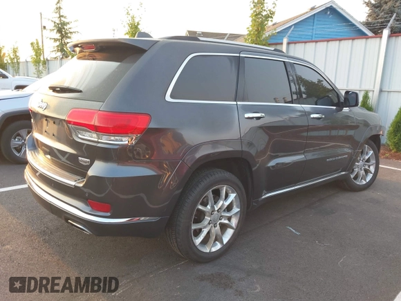2015 Jeep Grand Cherokee Summit with VIN 1C4RJFJT3FC748507, listed as a IAAI auction lot 40271829 with 86,859 mi miles. Bid and sale history available at carsss.com. Image 4.
