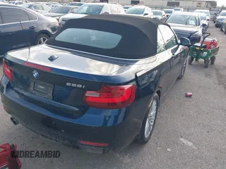 2015 BMW 2 Series 228i with VIN WBA1K5C58FV473737, listed as a IAAI auction lot 42383363 with Not provided miles and . Bid and sale history available at DreamBid. Image 4.