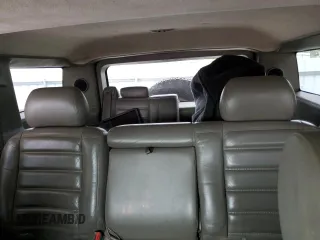 2003 Hummer H2 with VIN 5GRGN23U33H118459, listed as a Copart auction lot 77765694 with 157,390 mi miles and Salvage Title. Bid and sale history available at carsss.com. Image 10.