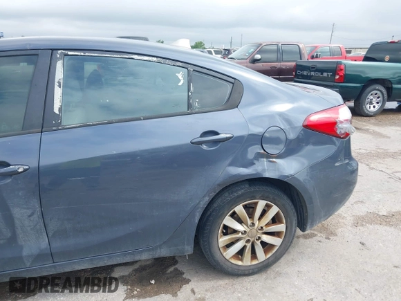 2014 Kia Forte LX with VIN KNAFX4A62E5221011, listed as a IAAI auction lot 42063598 with 187,649 mi miles. Bid and sale history available at carsss.com. Image 6.