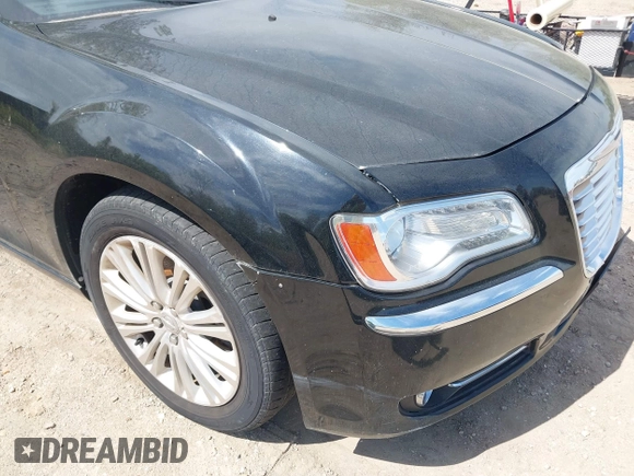 2013 Chrysler 300 with VIN 2C3CCAKG2DH645193, listed as a IAAI auction lot 42105459 with 230,063 mi miles. Bid and sale history available at carsss.com. Image 6.