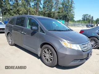 2012 Honda Odyssey EX-L z VIN 5FNRL5H64CB127523, wystawiony jako IAAI lot #39818448 z przebiegiem 102 514 mil mil oraz . Historia ofert i sprzedaży dostępna na DreamBid. Obrazek 1.