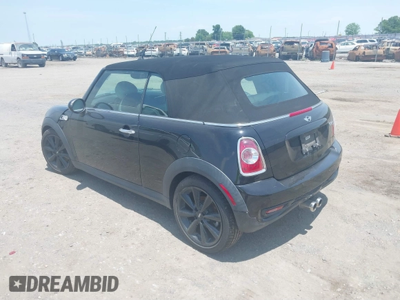 2013 MINI Convertible S with VIN WMWZP3C59DT550746, listed as a IAAI auction lot 39538986 with 59,934 mi miles and . Bid and sale history available at DreamBid. Image 3.