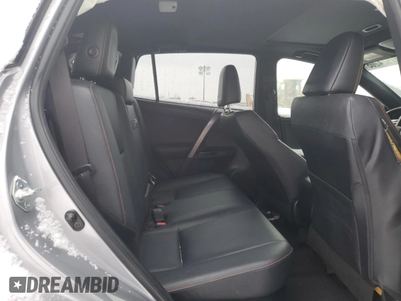 2017 Toyota RAV4 SE z VIN JTMJJREV2HD077614, wystawiony jako Copart lot #87924205 z przebiegiem 92 896 mil mil oraz Szkoda całkowita • Salvage title. Historia ofert i sprzedaży dostępna na DreamBid. Obrazek 11.