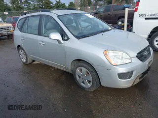 2009 Kia Rondo LX with VIN KNAFG528997240042, listed as a IAAI auction lot 41824613 with 269,209 mi miles. Bid and sale history available at carsss.com. Image 1.