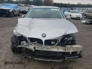 2005 BMW 3 Series 330i with VIN WBAEV53415KM42569, listed as a Copart auction lot 82333804 with 195,594 mi miles and Salvage Title. Bid and sale history available at carsss.com. Image 5.