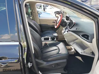 2023 Chrysler Pacifica Hybrid Touring L with VIN 2C4RC1L78PR543402, listed as a IAAI auction lot 41536710 with 35,867 mi miles. Bid and sale history available at carsss.com. Image 5.