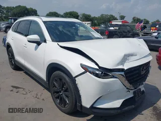 2022 Mazda CX-9 Touring Plus with VIN JM3TCBAY3N0626046, listed as a IAAI auction lot 42170265 with 21,823 mi miles and . Bid and sale history available at DreamBid. Image 1.