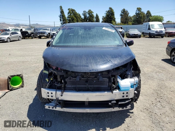 2021 Toyota Sienna LE с VIN 5TDKRKECXMS056186, выставлен на аукционе Copart как лот 57357395 с пробегом 30 580 миль миль и Списание • Salvage title. История ставок и продаж доступна на DreamBid. Изображение 5.