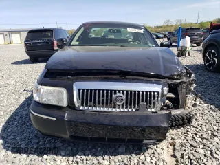 2010 Mercury Grand Marquis LS z VIN 2MEBM7FV8AX618001, wystawiony jako Copart lot #55382305 z przebiegiem 209 814 mil mil oraz Tytuł czysty. Historia ofert i sprzedaży dostępna na DreamBid. Obrazek 5.