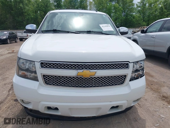 2012 Chevrolet Tahoe LTZ with VIN 1GNSKCE05CR177535, listed as a IAAI auction lot 42149054 with 184,830 mi miles and . Bid and sale history available at DreamBid. Image 12.