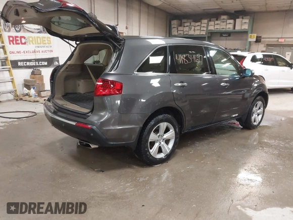 2010 Acura MDX Technology Pkg with VIN 2HNYD2H6XAH515333, listed as a IAAI auction lot 41834679 with 128,224 mi miles. Bid and sale history available at carsss.com. Image 4.