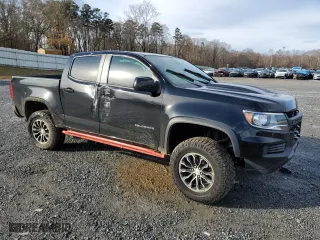 2021 Chevrolet Colorado 4WD ZR2 with VIN 1GCGTEEN8M1232532, listed as a Copart auction lot 85311714 with 41,958 mi miles and Salvage Title. Bid and sale history available at carsss.com. Image 4.