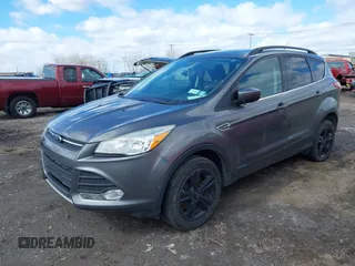 2014 Ford Escape SE with VIN 1FMCU9GX3EUB26129, listed as a IAAI auction lot 41987470 with 139,005 mi miles. Bid and sale history available at carsss.com. Image 2.