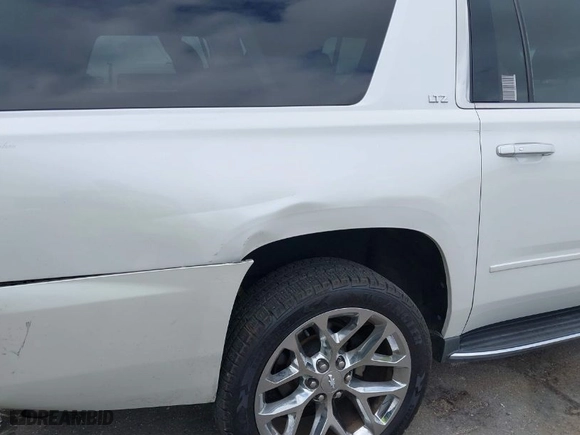 2016 Chevrolet Suburban LTZ with VIN 1GNSKJKCXGR166782, listed as a IAAI auction lot 41562200 with NaN miles. Bid and sale history available at carsss.com. Image 20.
