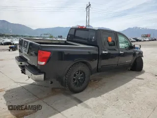 2009 Nissan Titan LE with VIN 1N6BA07C59N314908, listed as a Copart auction lot 58849325 with Not provided miles and Salvage title. Bid and sale history available at DreamBid. Image 3.