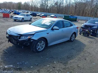 2018 Kia Optima LX with VIN 5XXGT4L3XJG201472, listed as a IAAI auction lot 41394624 with 84,950 mi miles. Bid and sale history available at carsss.com. Image 2.