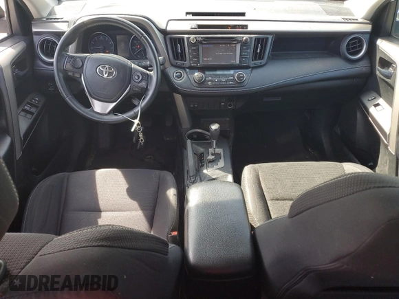 2018 Toyota RAV4 XLE with VIN 2T3WFREV4JW476959, listed as a Copart auction lot 51593265 with 198,596 mi miles and Salvage Title. Bid and sale history available at DreamBid. Image 8.