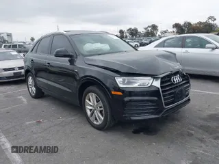 2018 Audi Q3 Premium with VIN WA1BCCFS6JR019279, listed as a IAAI auction lot 41713200 with 71,648 mi miles. Bid and sale history available at carsss.com. Image 1.