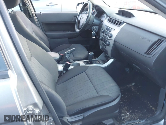 2008 Ford Focus SE with VIN 1FAHP35N98W165970, listed as a IAAI auction lot 42028598 with 242,004 mi miles and . Bid and sale history available at carsss.com. Image 5.