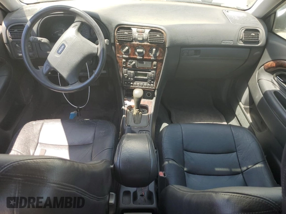 2000 Volvo S40 с VIN YV1VS255XYF542810, выставлен на аукционе Copart как лот 62570624 с пробегом 180 692 миль миль и Списание • Salvage title. История ставок и продаж доступна на DreamBid. Изображение 8.