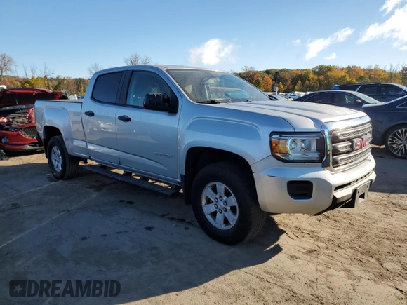 2015 GMC Canyon 2WD with VIN 1GTG5AE35F1143280, listed as a Copart auction lot 75846964 with 116,845 mi miles and Salvage Title. Bid and sale history available at DreamBid. Image 4.
