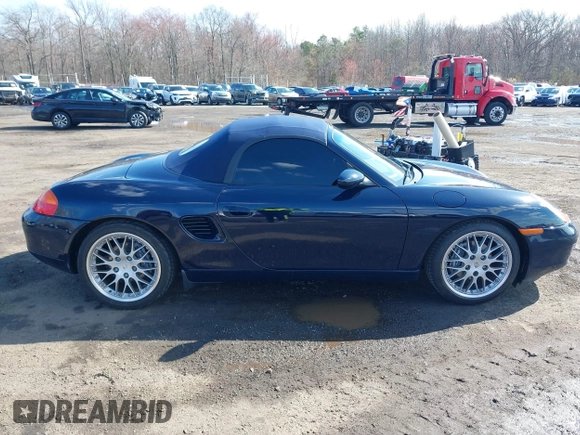 2001 Porsche Boxster z VIN WP0CA29861S620159, wystawiony jako IAAI lot #41868701 z przebiegiem 38 776 mil mil oraz . Historia ofert i sprzedaży dostępna na DreamBid. Obrazek 13.