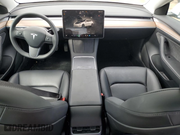 2023 Tesla Model 3 with VIN 5YJ3E1EA0PF575488, listed as a Copart auction lot 56889115 with 18,677 mi miles and Clean title. Bid and sale history available at DreamBid. Image 8.