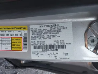 2015 Ford Fusion S Hybrid with VIN 3FA6P0UU7FR307568, listed as a IAAI auction lot 41421139 with 152,186 mi miles. Bid and sale history available at carsss.com. Image 9.
