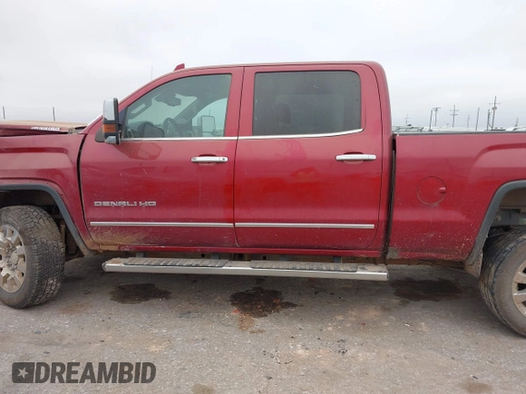 2019 GMC Sierra 2500HD Denali with VIN 1GT12SEYXKF218861, listed as a IAAI auction lot 41176336 with 130,225 mi miles. Bid and sale history available at carsss.com. Image 14.