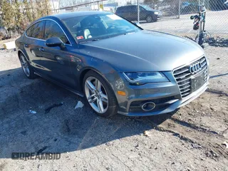 2014 Audi A7 Prestige with VIN WAU2GBFC8EN136322, listed as a IAAI auction lot 41345572 with 150,620 mi miles and . Bid and sale history available at DreamBid. Image 1.
