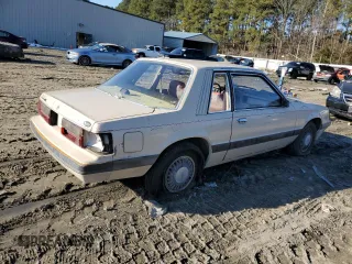 1986 Ford Mustang z VIN NOVIN42794605, wystawiony jako Copart lot #42794605 z przebiegiem 62 794 mil mil oraz Nie do naprawy • Non repairable. Historia ofert i sprzedaży dostępna na DreamBid. Obrazek 3.