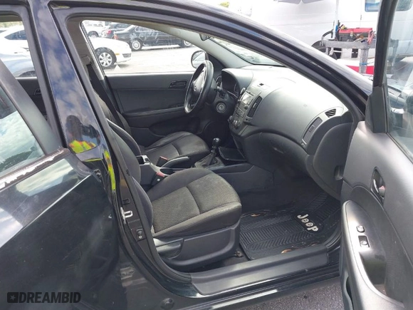 2010 Hyundai Elantra Touring GLS with VIN KMHDB8AE7AU075949, listed as a IAAI auction lot 41426249 with 231,611 mi miles. Bid and sale history available at carsss.com. Image 5.